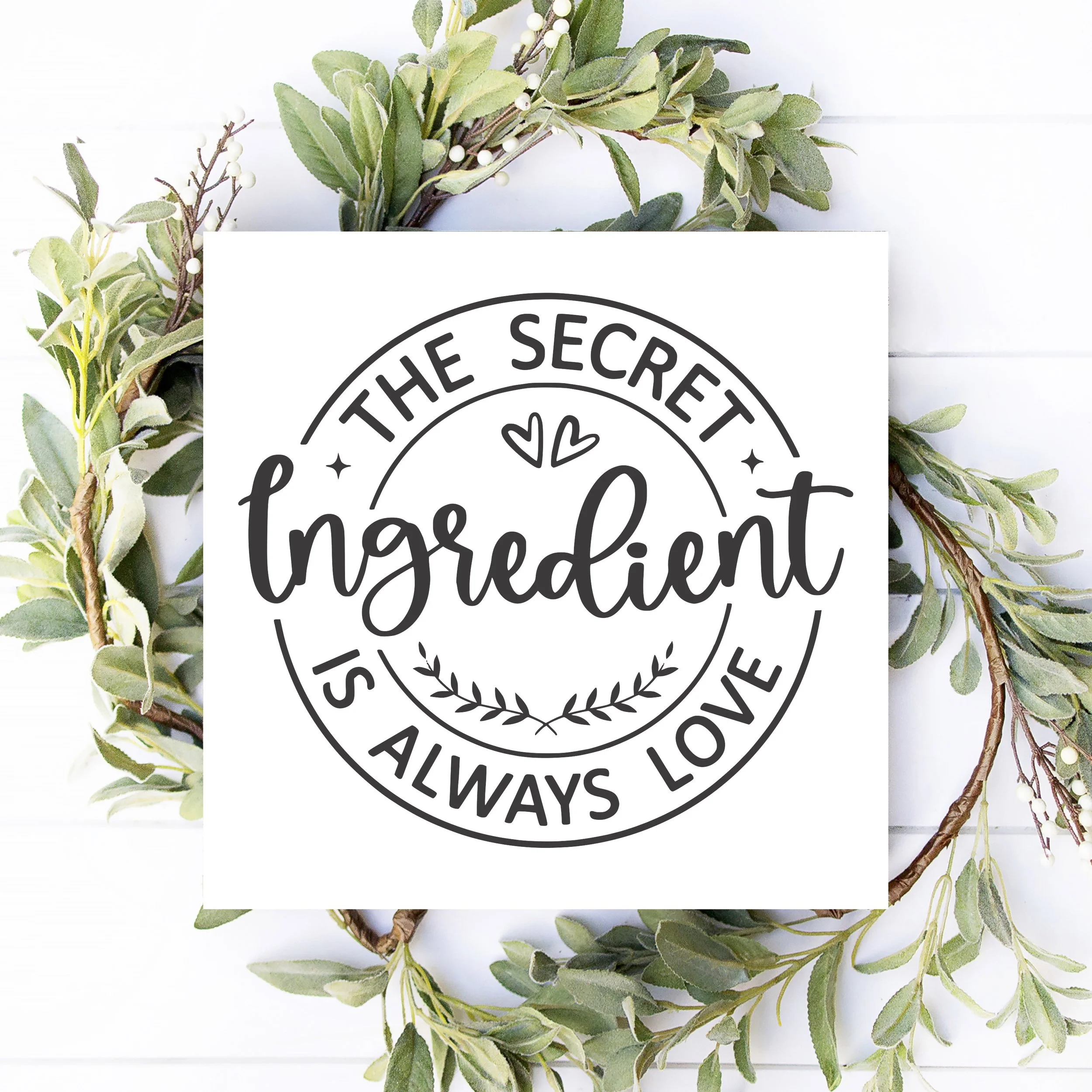 12x12 vthe secret ingredient is always love sign valentines Day mock up.jpg