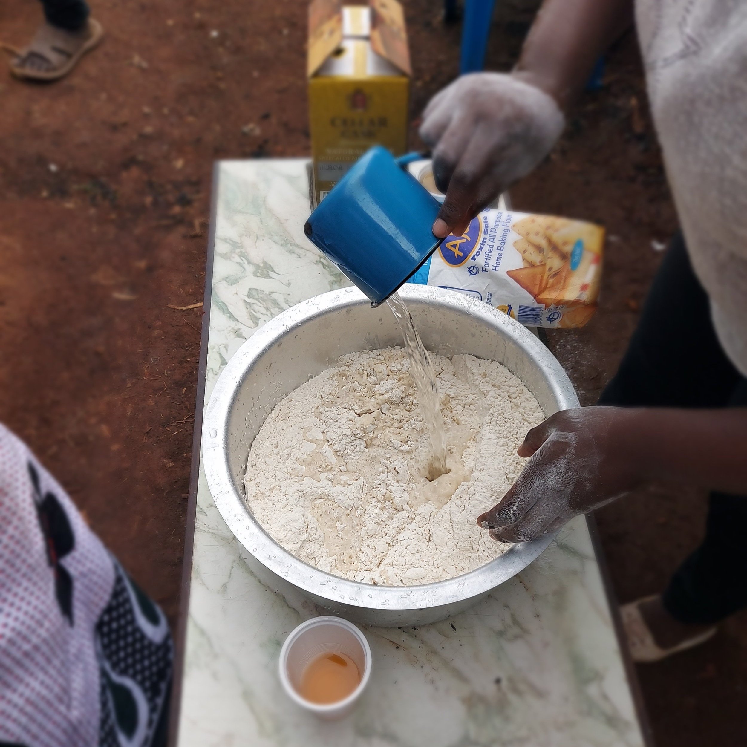 Prepping the chapati mixture of flour and water