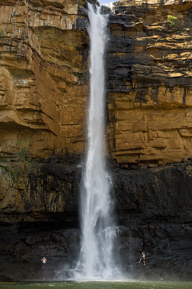 Fresh water swimming under a water fall. Despite cruising the ocean, swimming is only permitted in the fresh water due to Salt Water Crocodiles.