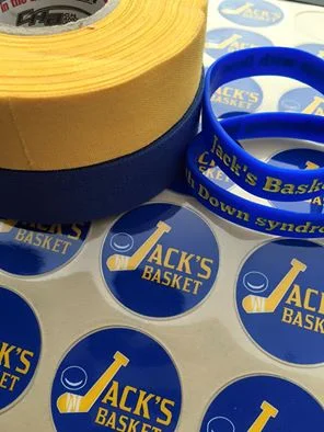 Stickers for the helmets, Down syndrome awareness colors for the hockey tape, and wristbands to spread the mission!
