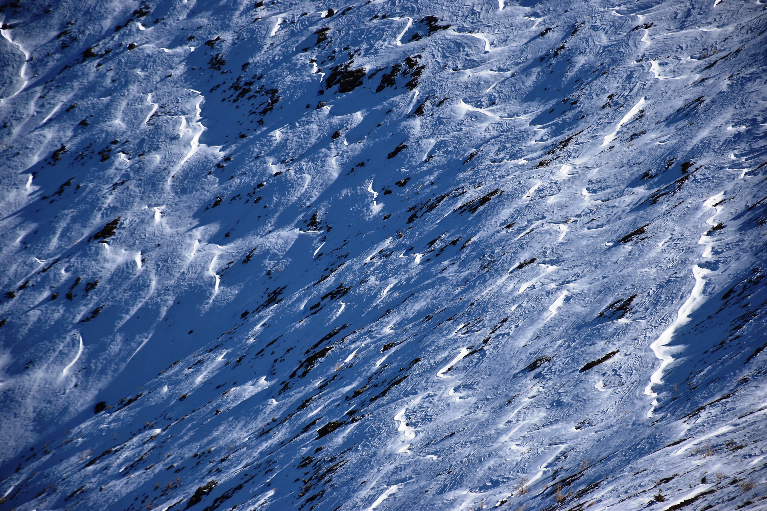 wind sculptured October snow