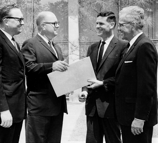 architect-john-desmond-receiving-aia-award-for-his-design-of-the-new-state-library-building-in-baton-rouge-louisiana-in-1958.jpg