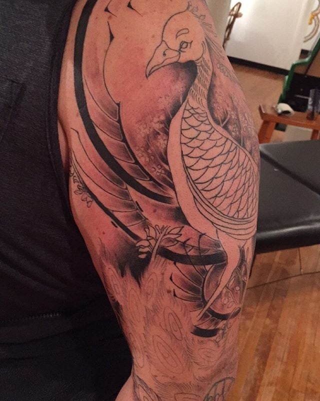 Chris @killabunzz started to #shade in @myrcide #sleeve #tattoo of a #peacock
#peacocktattoo #colorful #color #colortattoo #custom #artist #threequartersleeve #bird #birdtattoo #waukegan #waukeganillinois #lakecountyil #chicago #chicagotattooartist #oneofakind #blackandgrey #background