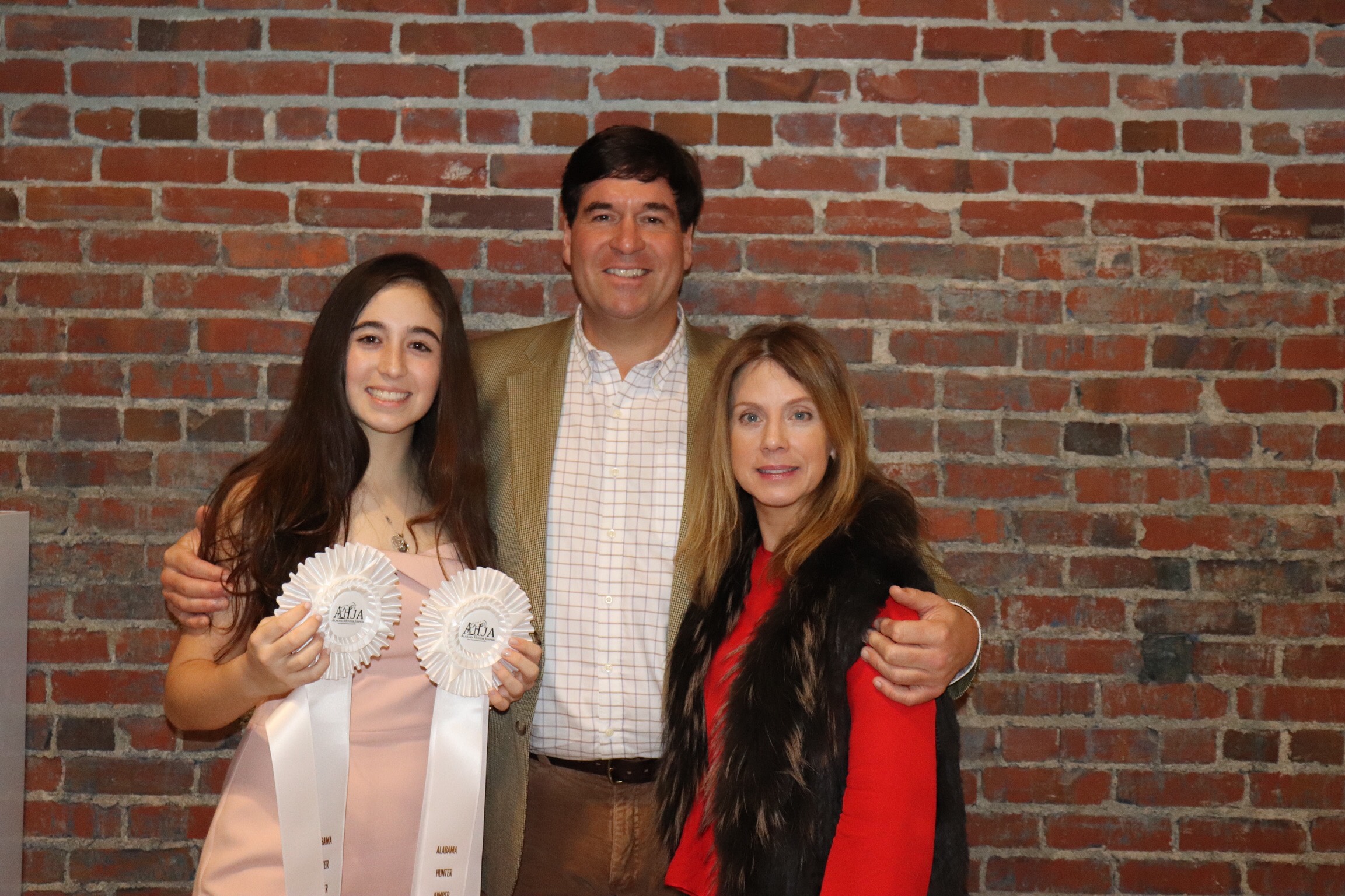 Paloma and her parents celebrating her 2018 successes!