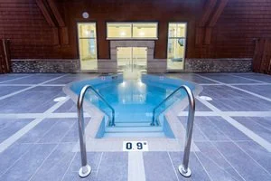 Indoor/Outdoor Hot Tub | Grande Rockies Resort