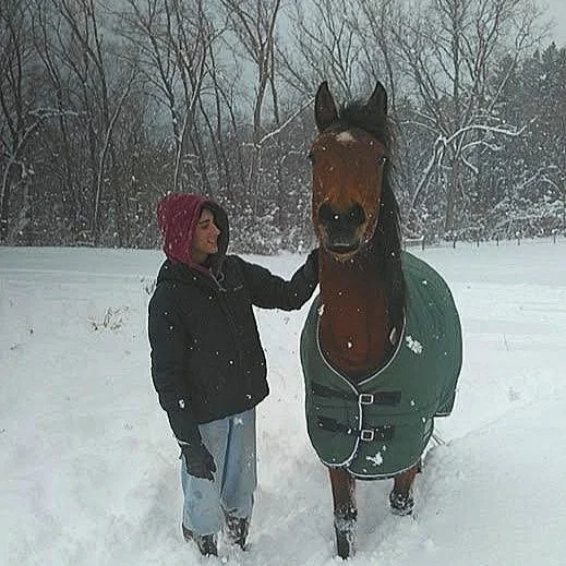 Maya and her gelding Lorenzo playing in the snow!