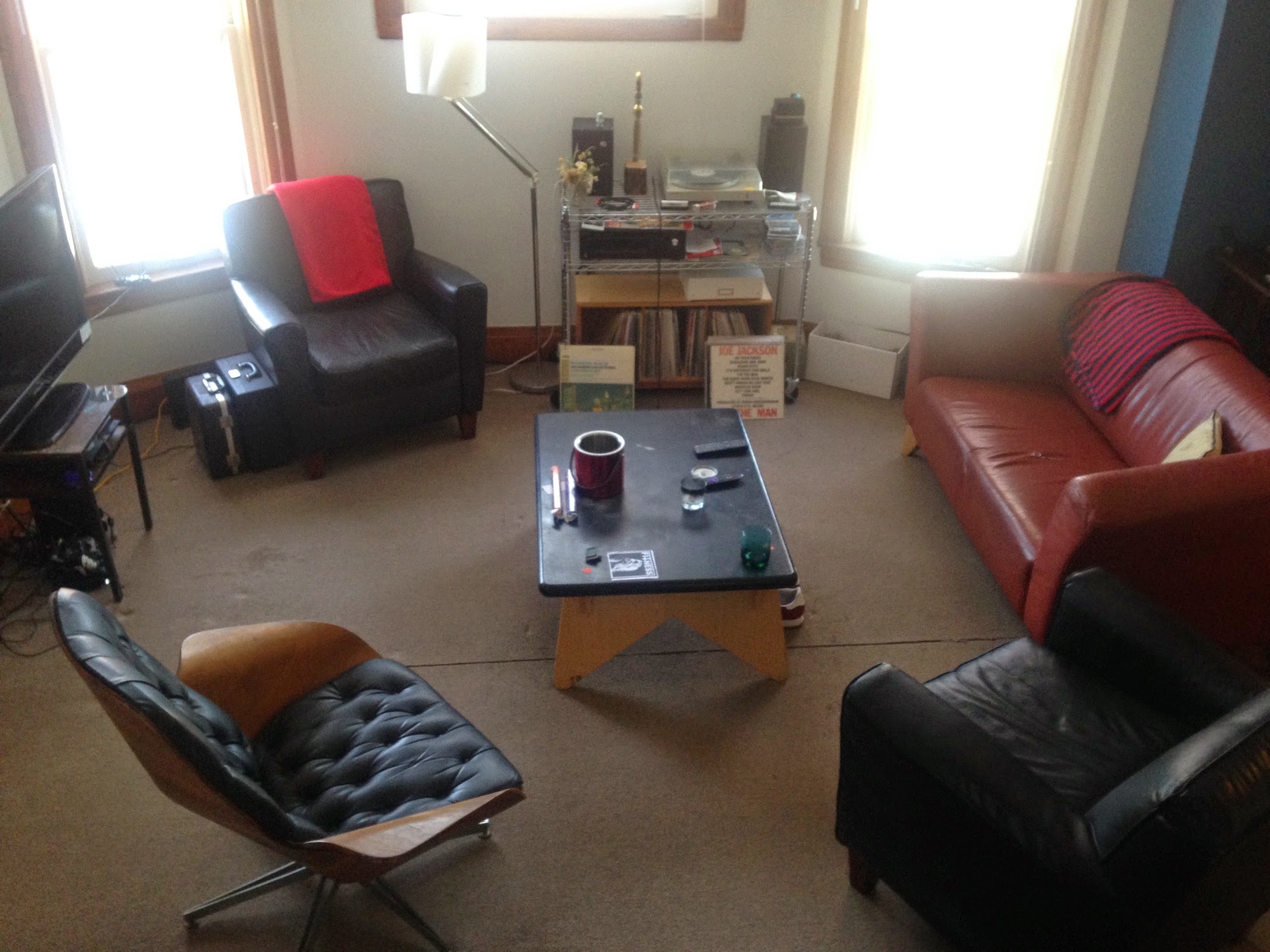 We actually just rearranged our living room, and this is SO MUCH BETTER than what it was like before. But still, it smells.