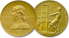 Daniel Chester French (1850-1931) designed the gold medallion in 1917.