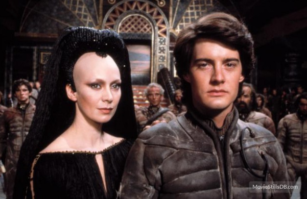 Kyle MacLachlan as Paul Muad-dib Atreides supported by his mother, Jessica. Publicity still from the Universal Studios movie. 