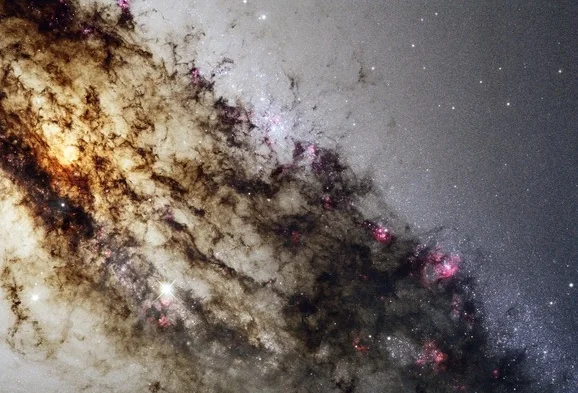 Life, the universe, and everything? (Photo of the galaxy Centaurus A , taken by the Hubble telescope.)