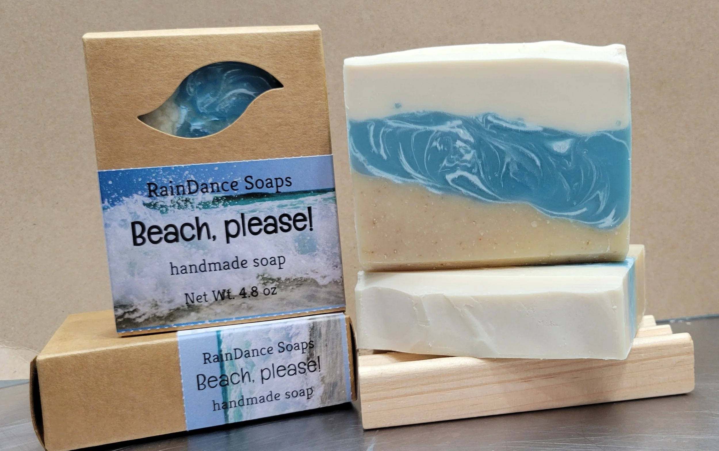 a three-layered soap with white, blue, and brown layers