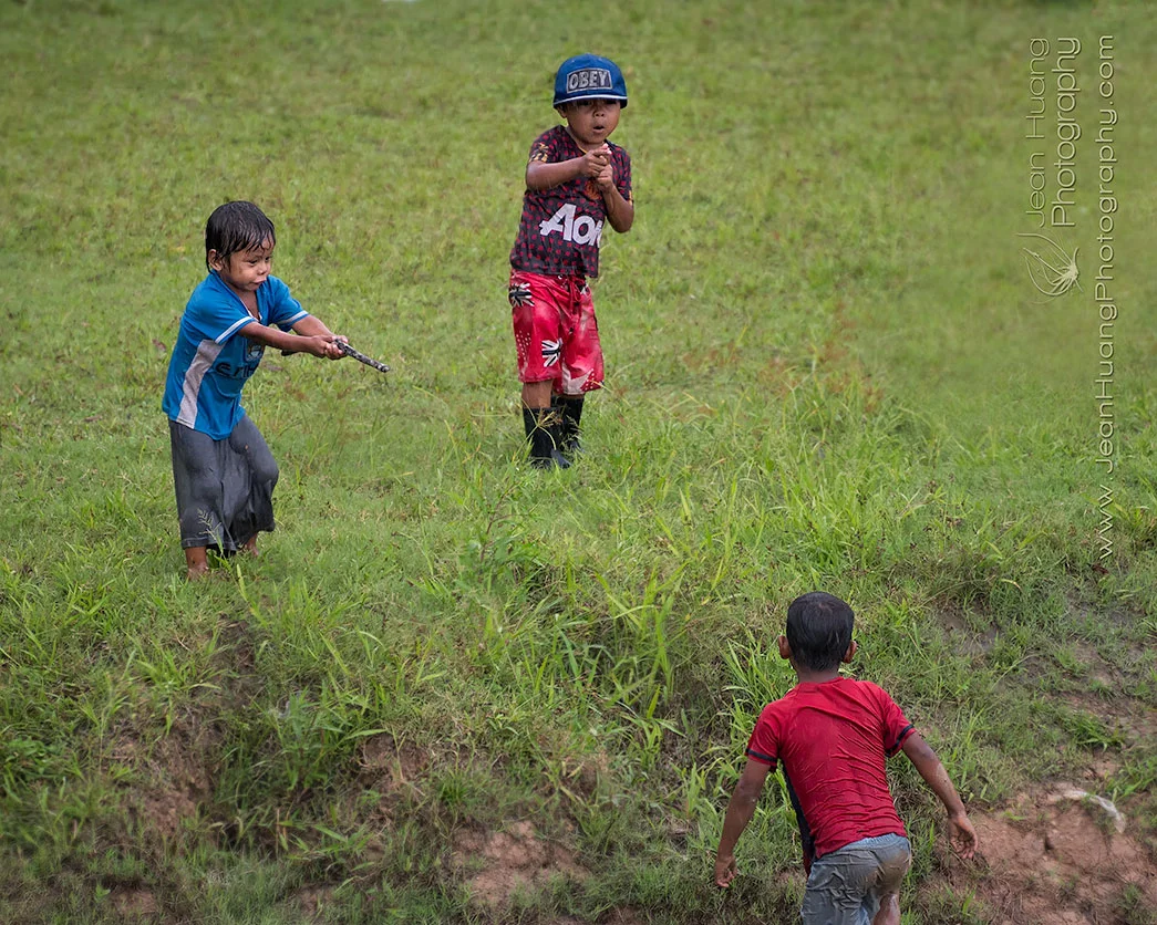 Children Playing in Rain - ©Jean Huang Photography