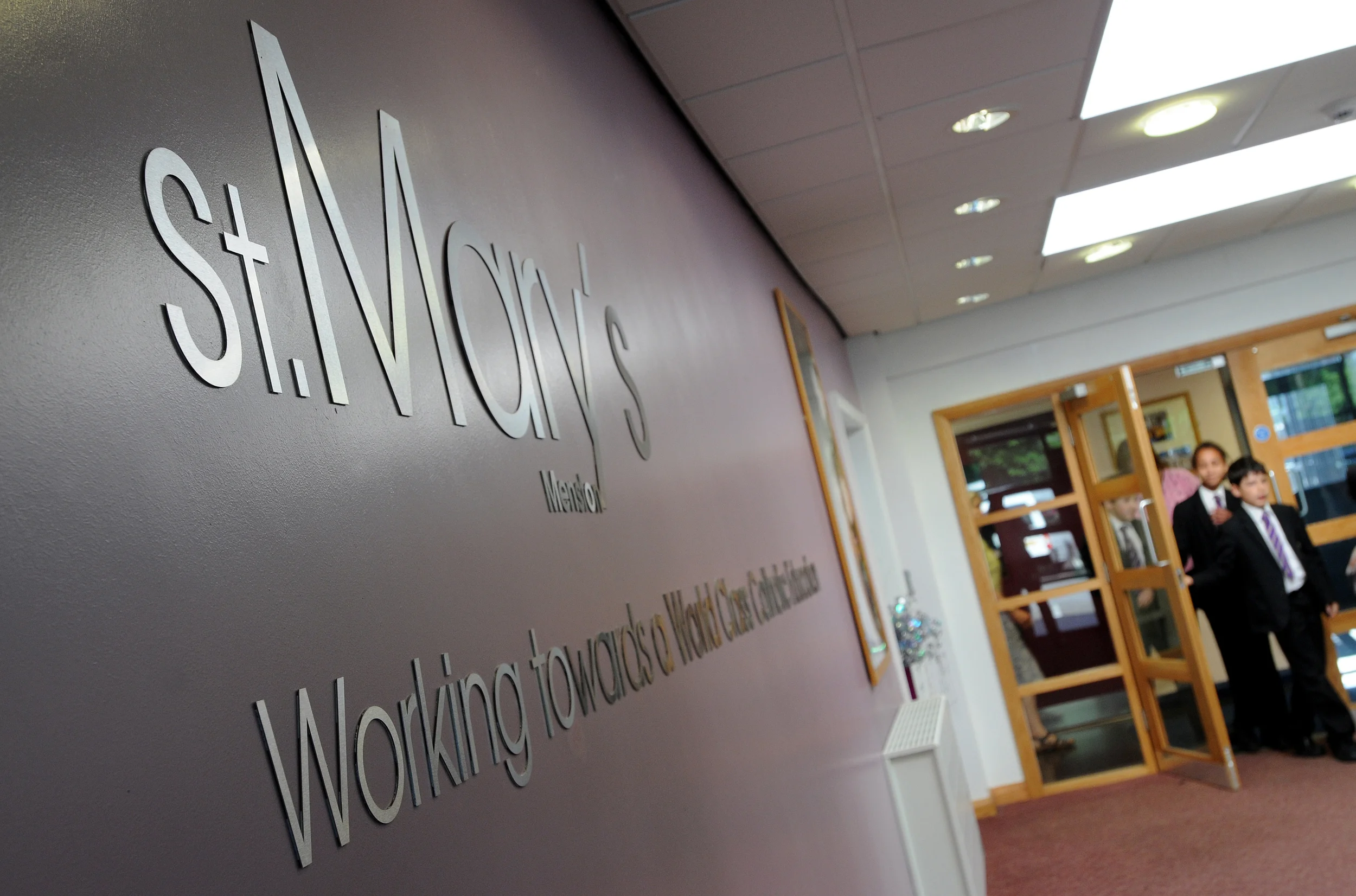 Laser cut, brushed stainless steel letters at St. Mary's Menston