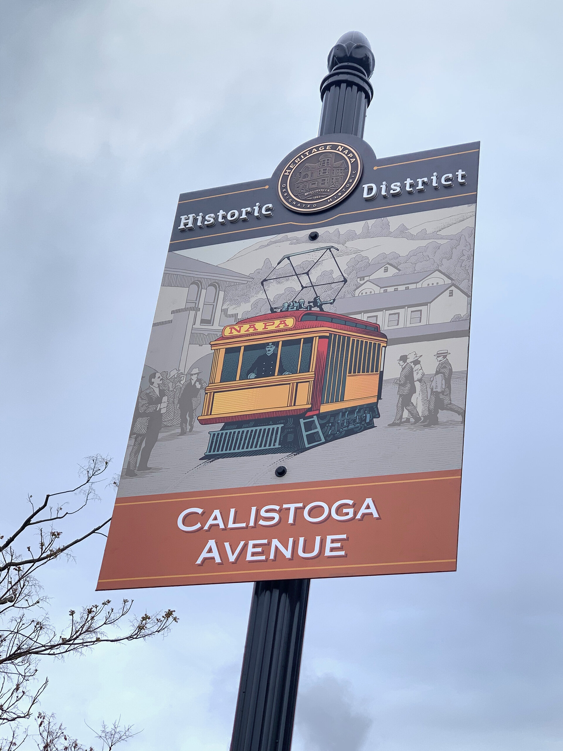 Sign Design with an electric railcar on Calistoga Avenue in Napa