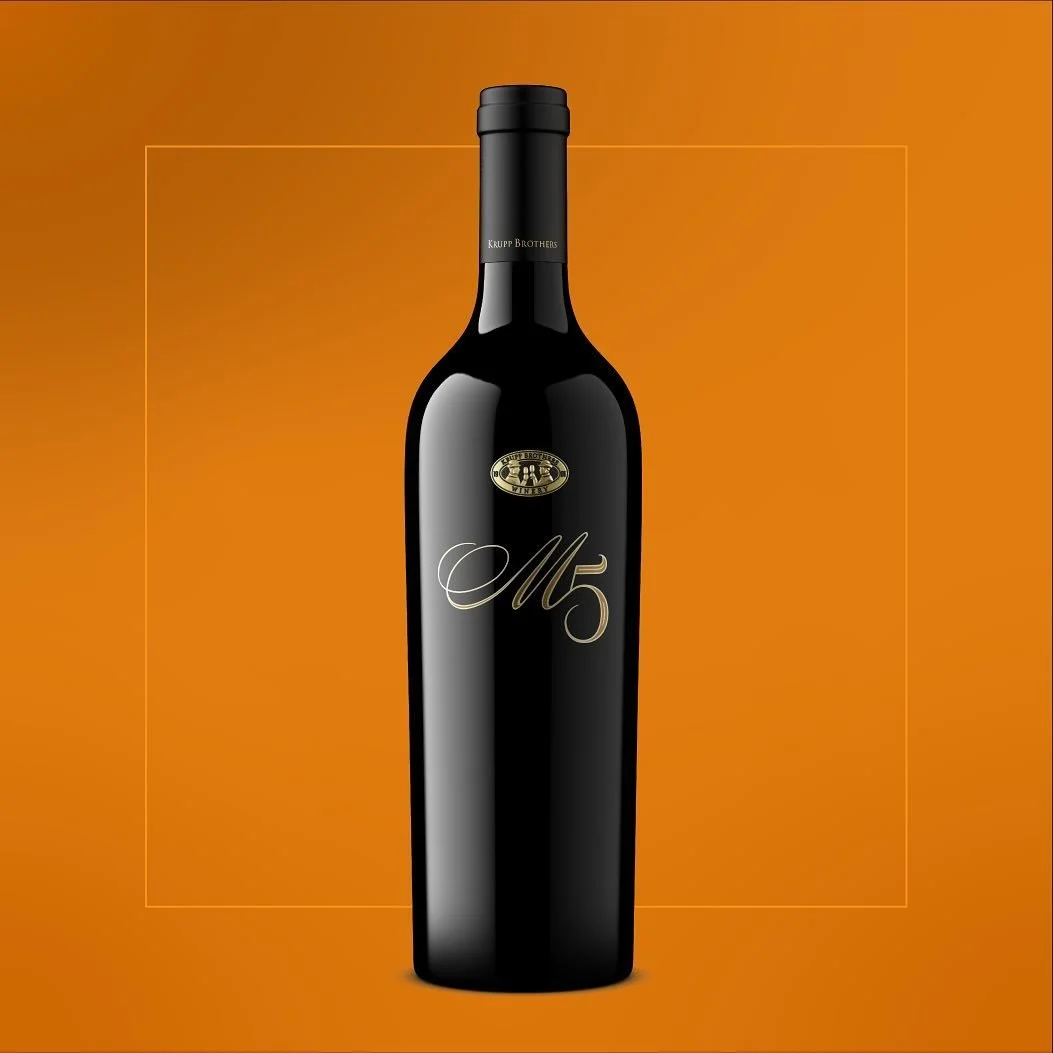 Krupp Brothers M5 label update. This bold Cabernet Sauvignon needed a bold package. Metal coin fabrication by @signet_branding silkscreen by @berginspe