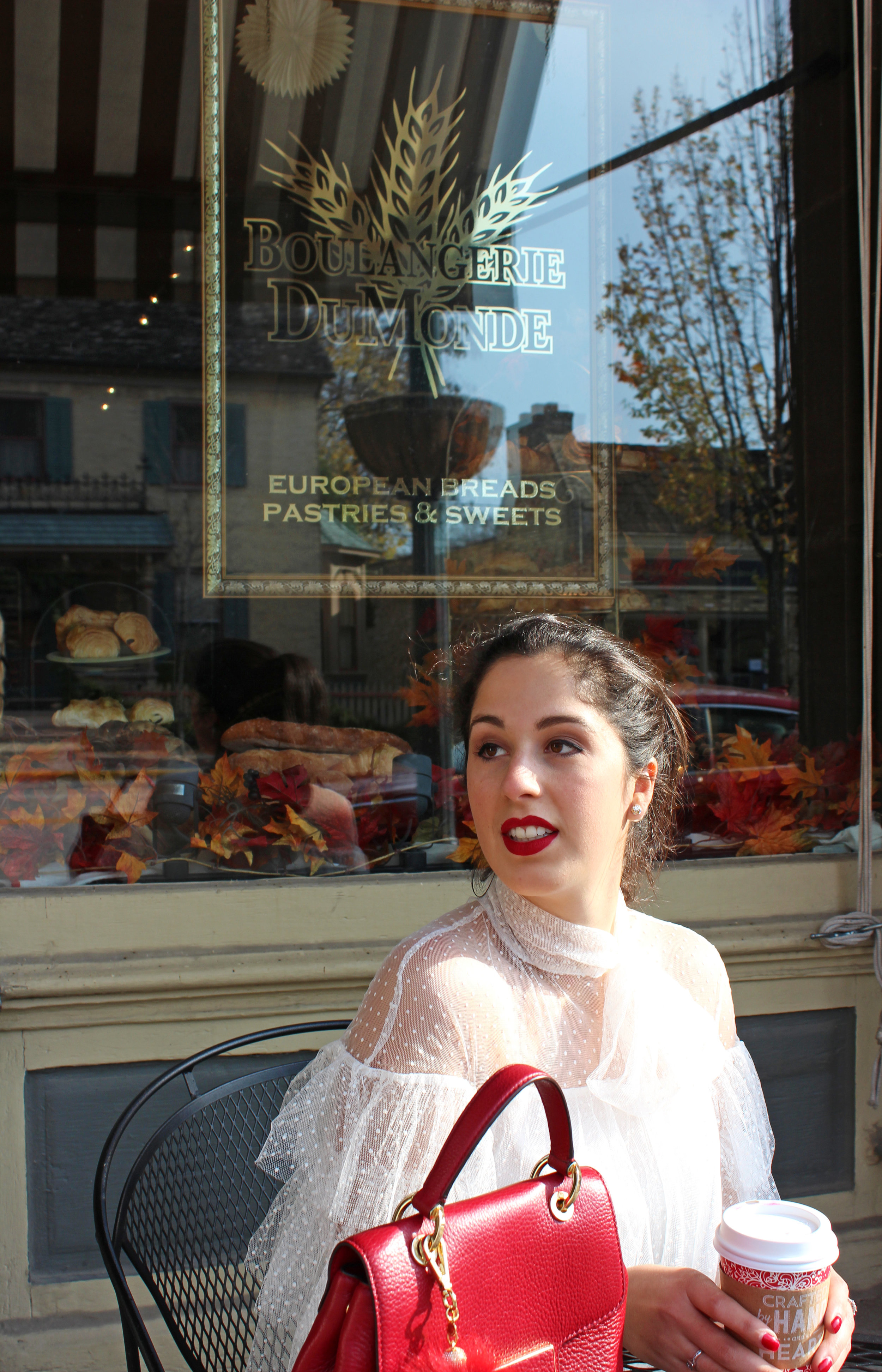 Madalyn Manzeck photographed by Cassie Sterwald in downtown Cedarburg in 2016. Dress Dezzal // Handbag Michael Kors (in black) // Shoes Aldo // Earrings Kate Spade // Lipstick Stila