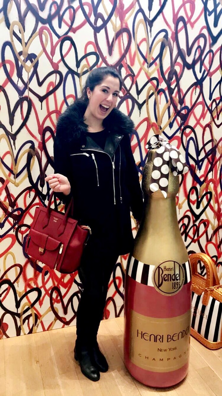 Madalyn in her happy place shopping at Henri Bendel