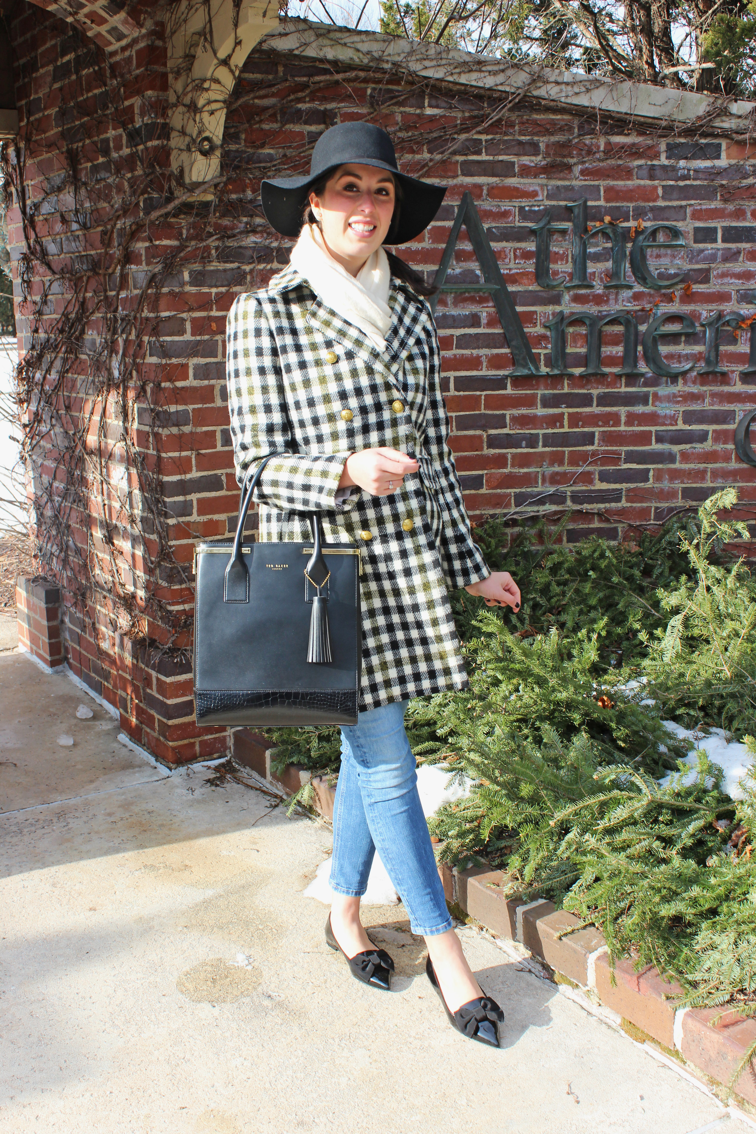 Madalyn Manzeck photographed by Cassie Sterwald at The American Club in Kohler, WI in 2017. Coat J. Crew | Jeans Zara | Flats M. Gemi | Handbag Ted Baker | Hat Francesa's | Earrings Kate Spade | Hair Bow J. Crew 