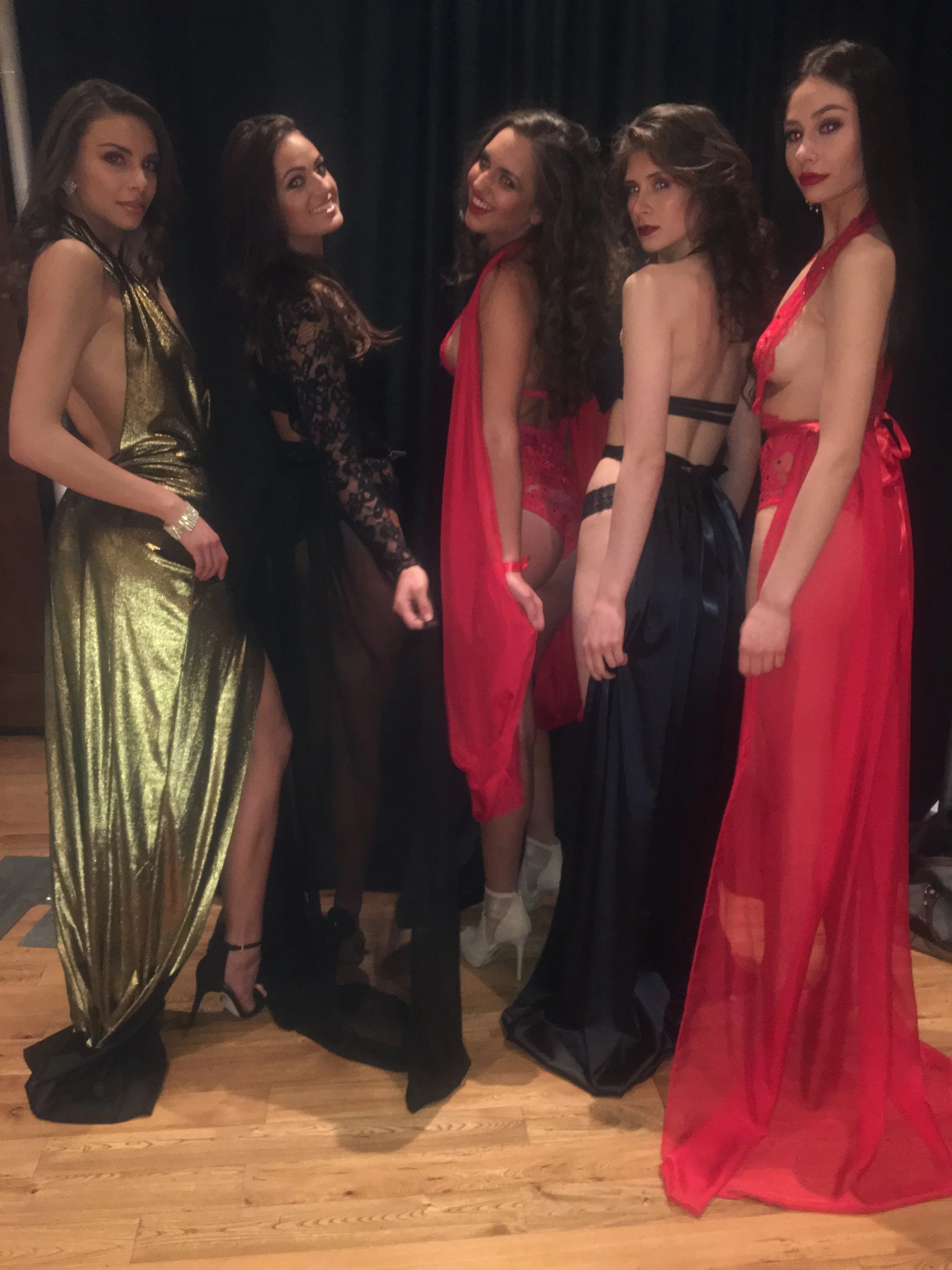 The fabulous models giving one last pose backstage before they walk the runway. 