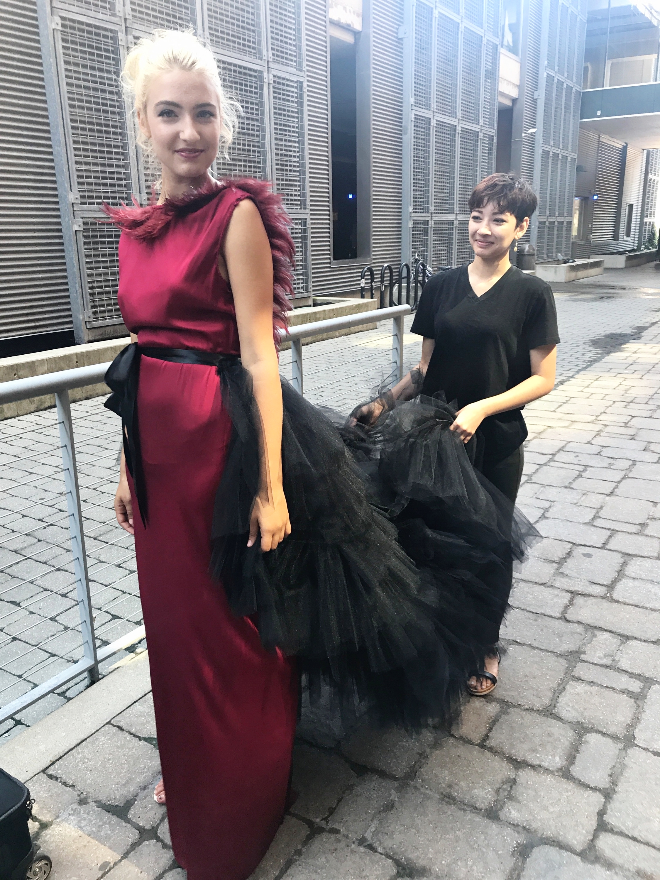Vanali making sure Leah's tulle skirt doesn't get dirty at the Milwaukee Magazine photo shoot back in July. 