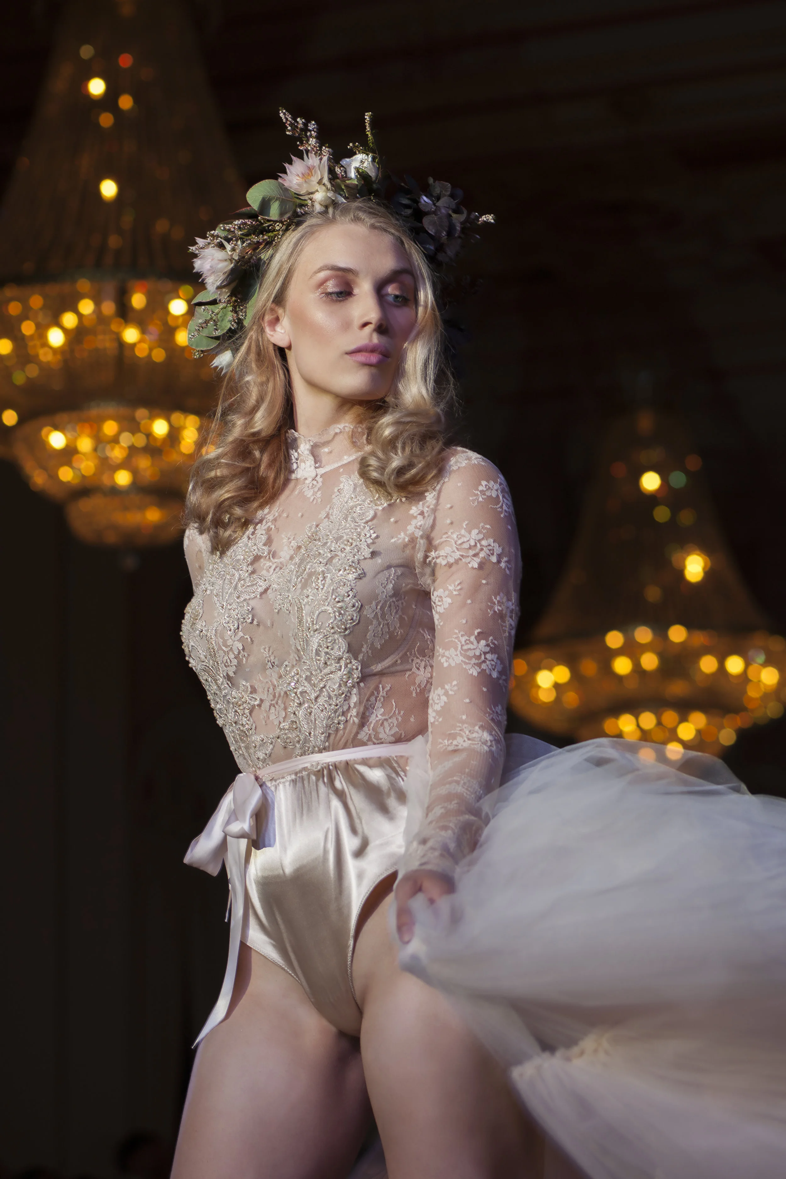 Holly Jo Steldt opening the show with this glittering hand appliqued champagne bodysuit and tiered tulle skirt. 