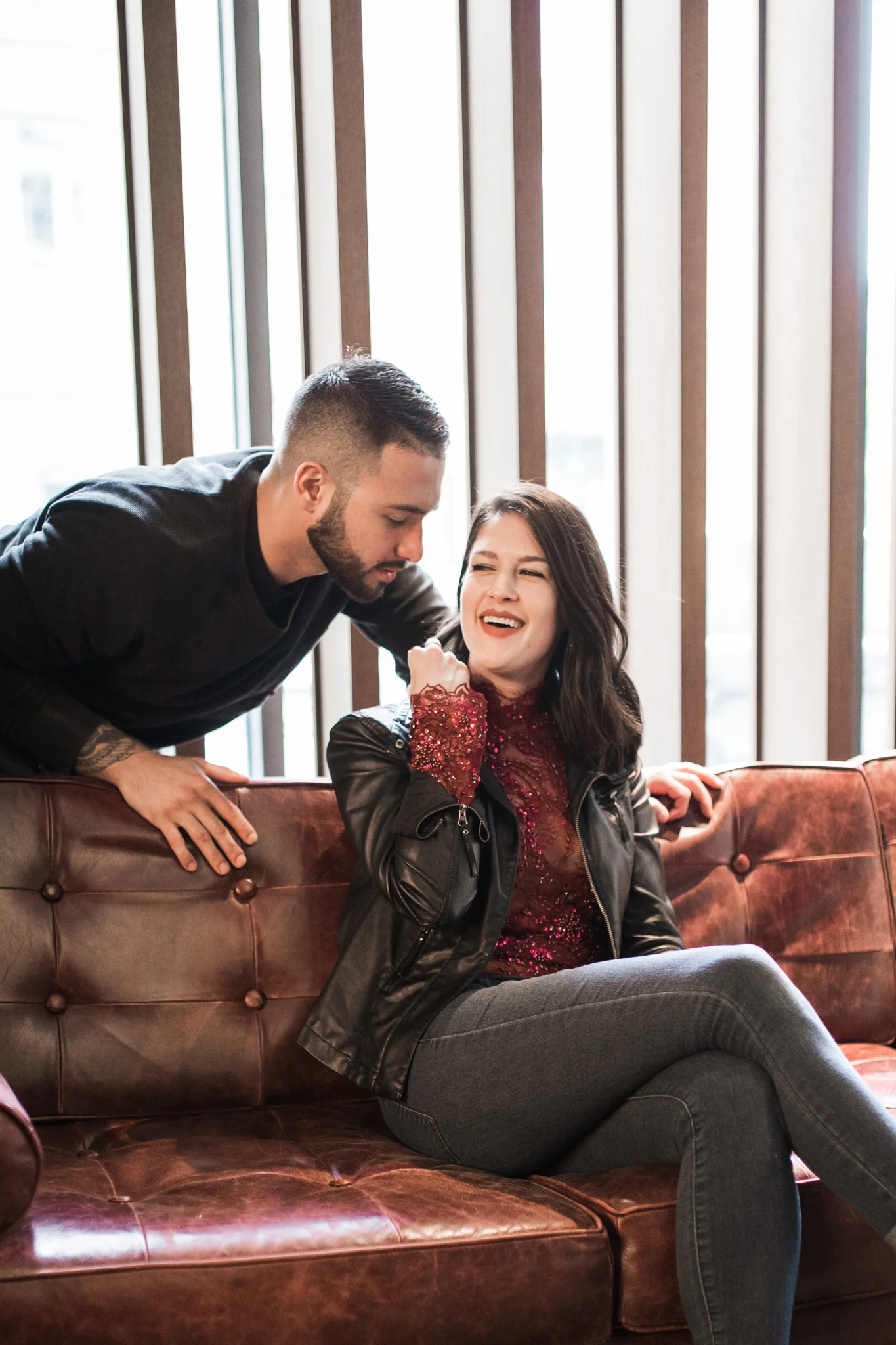 Katherine Clemins of Bordeaux BLVD wearing a Madalyn Joy Designs bodysuit with her beau, Jeisson Cuellar, photographed by Russ Heritage of Heritage Studio at the Kimpton Journeyman Hotel located in the Third Ward in Milwaukee. 2017. 