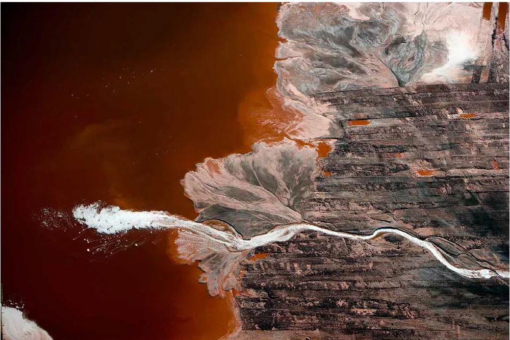 Plume of Foam in Bauxite Waste from Aluminum Refinery