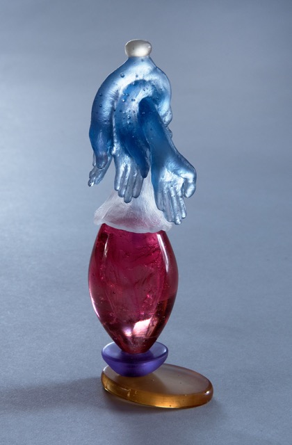 Handily Redolent, pink "egg" flacon with hyacinth and chardonnay base; purple hand plunger