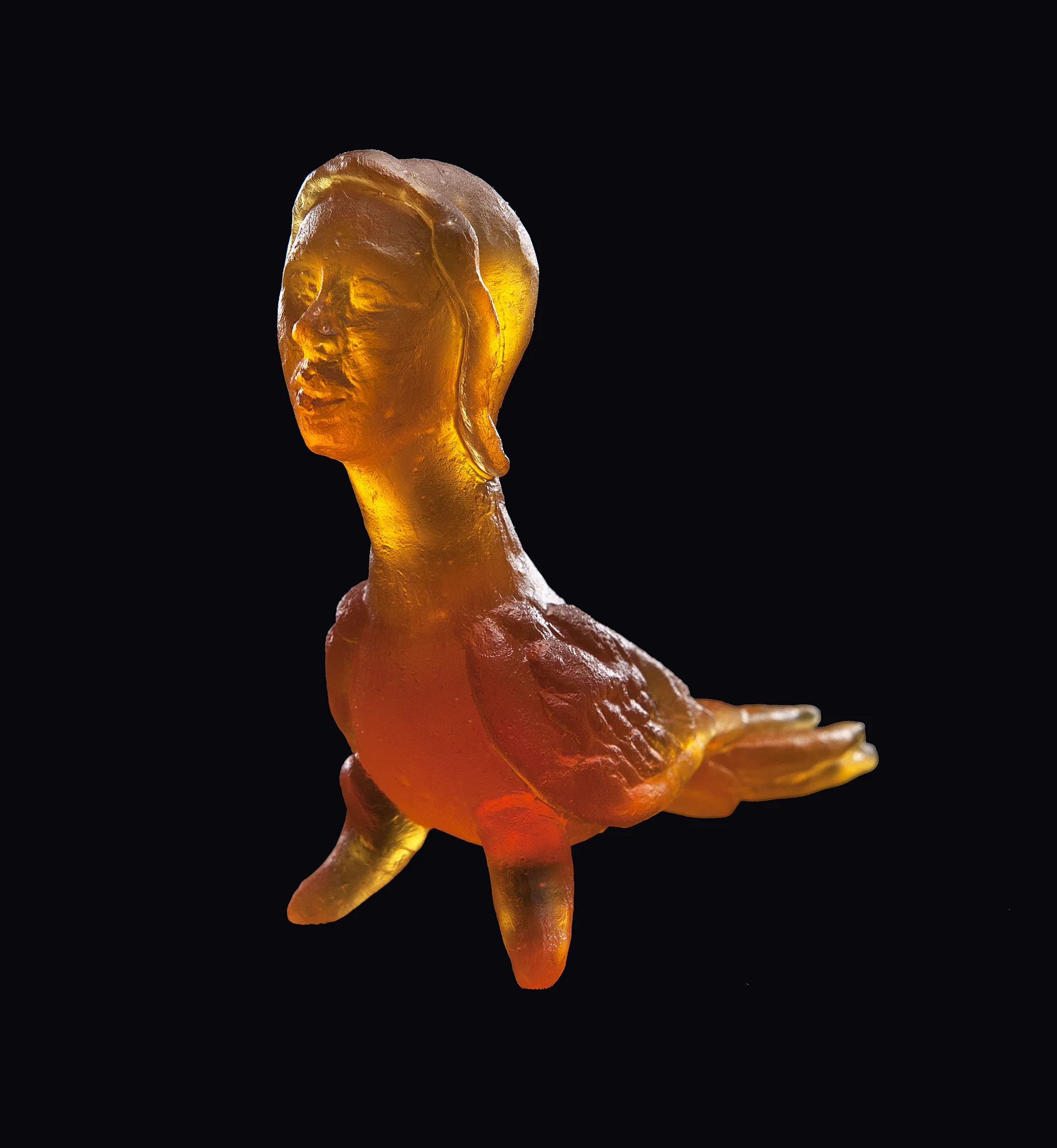 Amber Sentient, amber harpy with flacon resting atop tail; yellow plunger