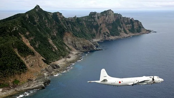 A Japanese Maritime Self-Defense Force’s P-3C patrols the Senkaku Islands. (AP)