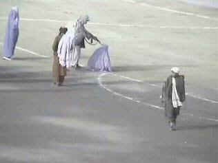 The Taliban executing an Afghan women in Kabul during their reign of terror.