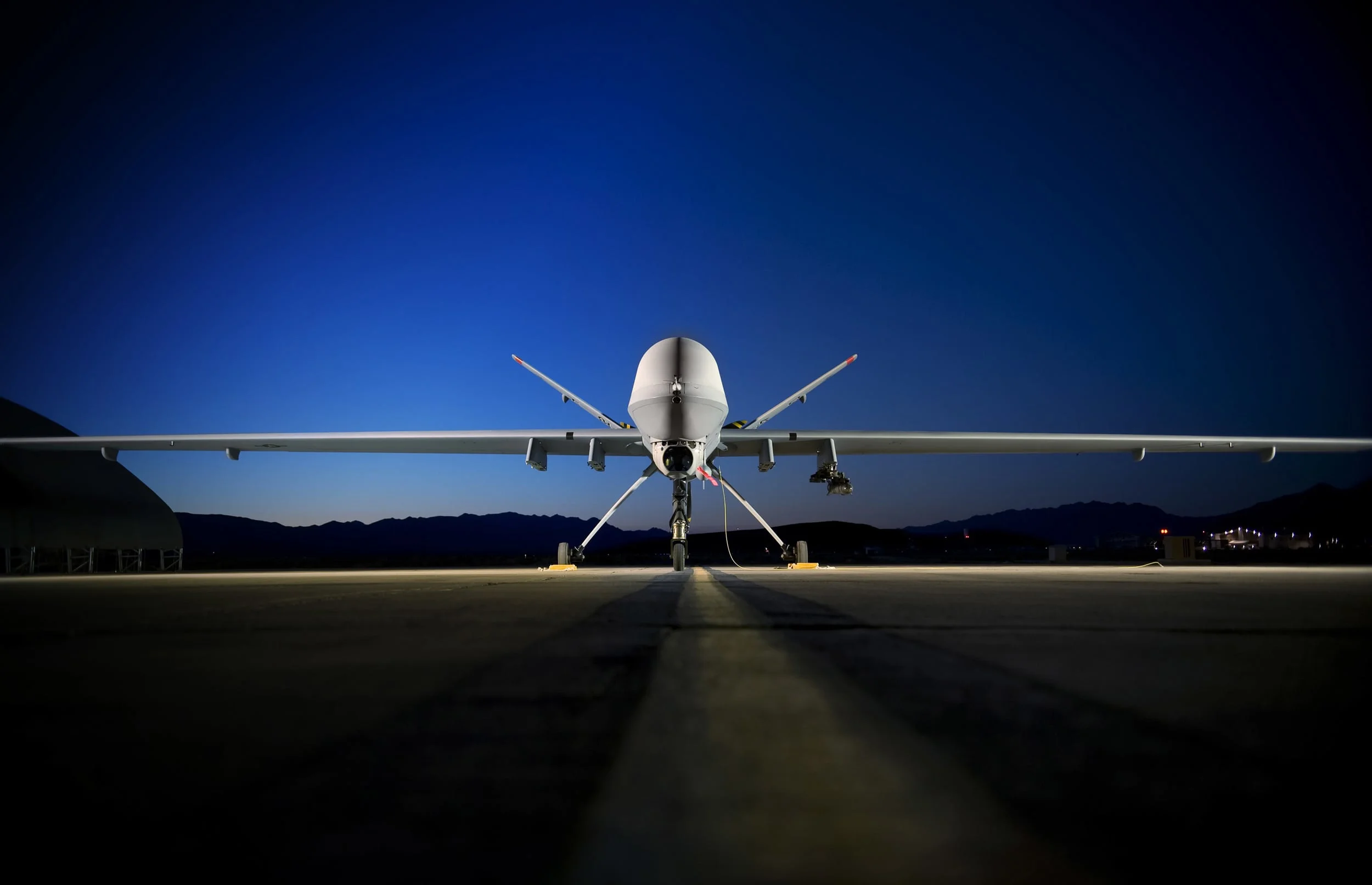 A MQ-9 “Reaper” remotely piloted aircraft sits on the flightline at Creech Air Force Base, NV. Photo by Lance Cheung, USAF (Wikimedia Commons)
