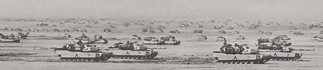 A Brigade of the U.S. 3rd Armored Division masses in northern Saudi Arabia in preparation for the invasion of Iraq during the Gulf War, February 1991. (Wikimedia Commons)
