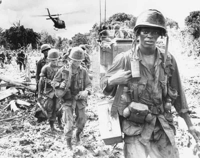 U.S. soldiers on a search-and-destroy patrol in Phuoc Tuy province, South Vietnam, June 1966 (U.S. Army Photo)