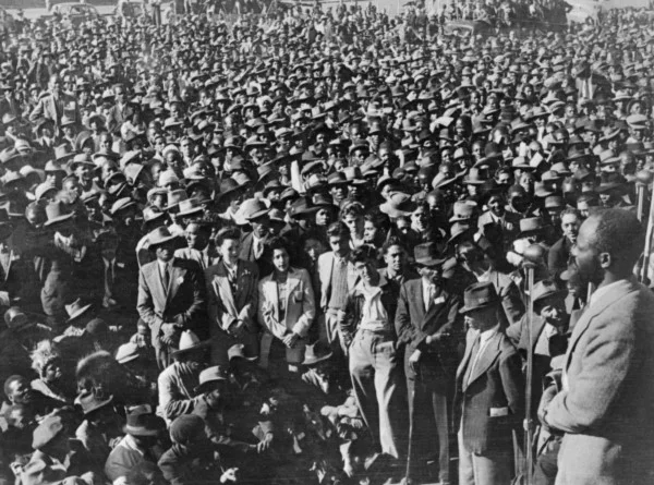 An unlocated photo taken in South Africa in the 1950s shows supporters of the African National Congress (ANC) gathering as part of a civil disobedience campaign to protest the apartheid regime of racial segregation | AFP/Getty Images