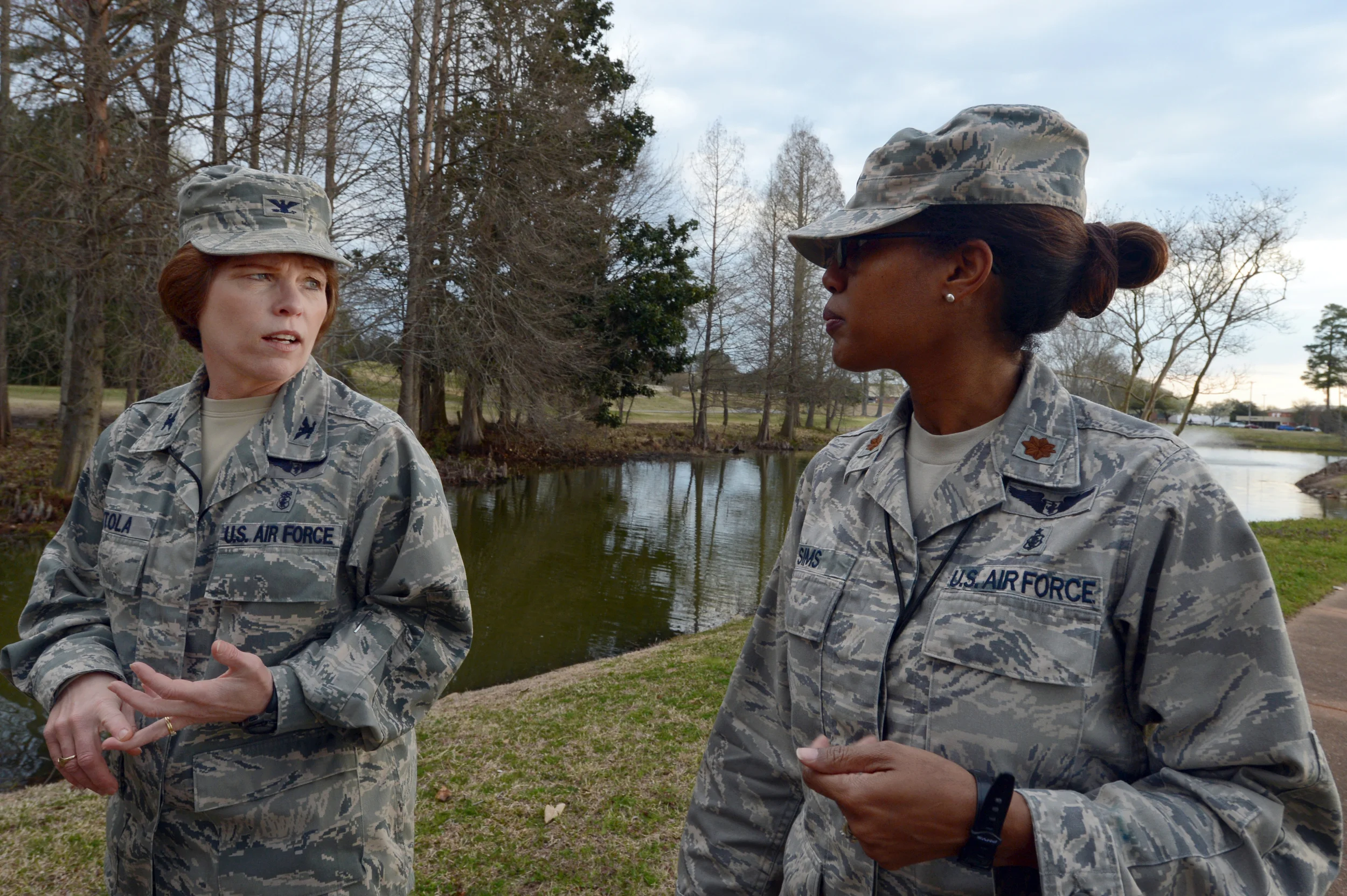 U.S. Air Forces Central Command deputy command surgeon (left), walks with AFCENT chief of clinical operations, during a mentoring session. (U.S. Air Force photo, A1C Jonathan Bass) 