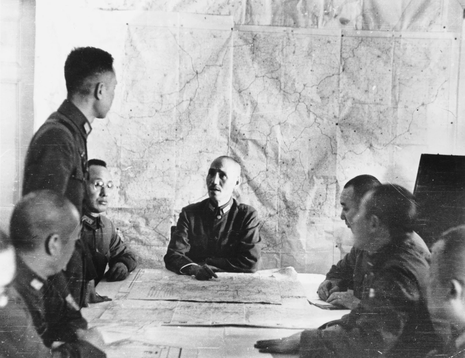 Chiang Kai-shek meeting with his staff during the Sino-Japanese War. (Encyclopædia Britannica Online)