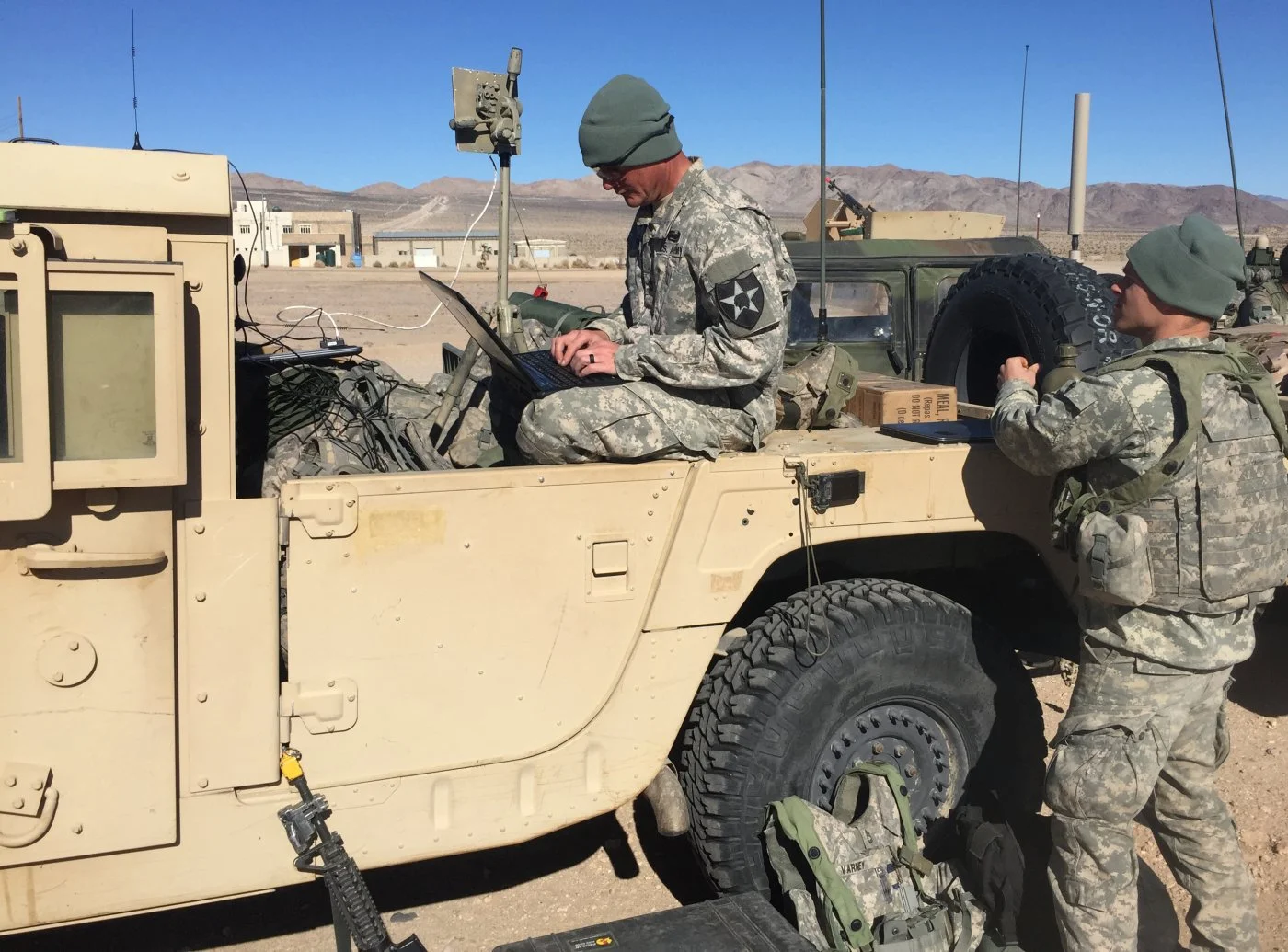 Soldiers with the 780th Military Intelligence Brigade conduct cyberspace operations during a training rotation for the 2nd Stryker Brigade Combat Team, 2nd Infantry Division, at the National Training Center at Fort Irwin, Calif., Jan. 24. The Fort Meade, Md.-based 780th was one of several cyber organizations that took part in the rotation as part of an pilot program to designed to help the Army develop how it will build and employ cyber in its tactical formations. (U.S. Army Photo)
