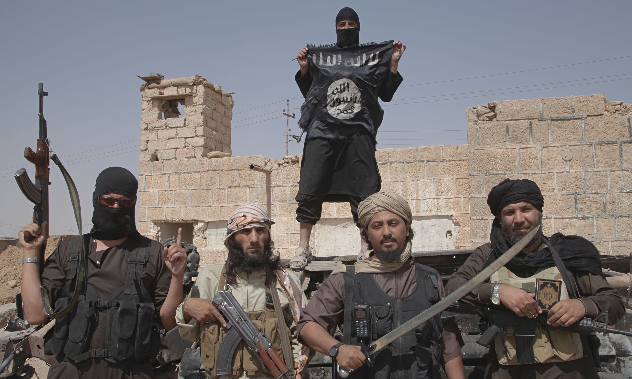 Islamic State fighters on the border between Syria and Iraq (Corbis/Medyan Dairieh)