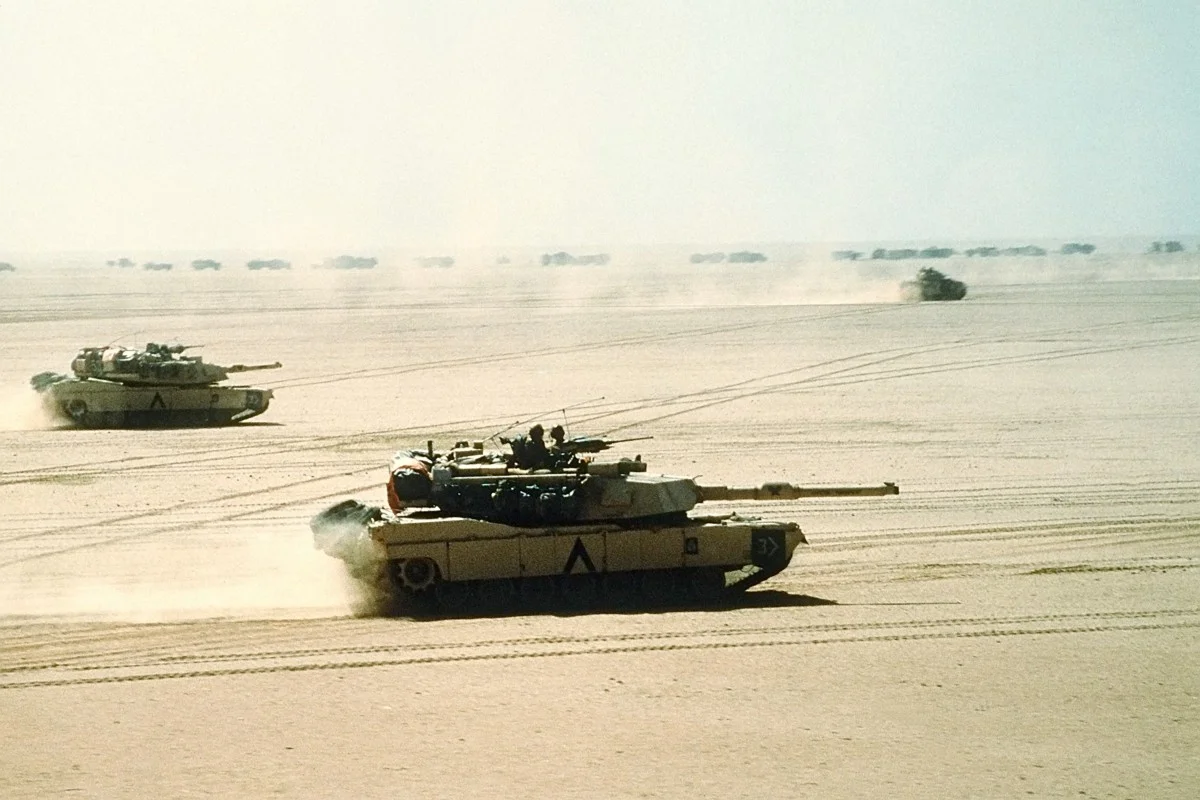 M1 Abrams tanks moving in formation during the Gulf War.