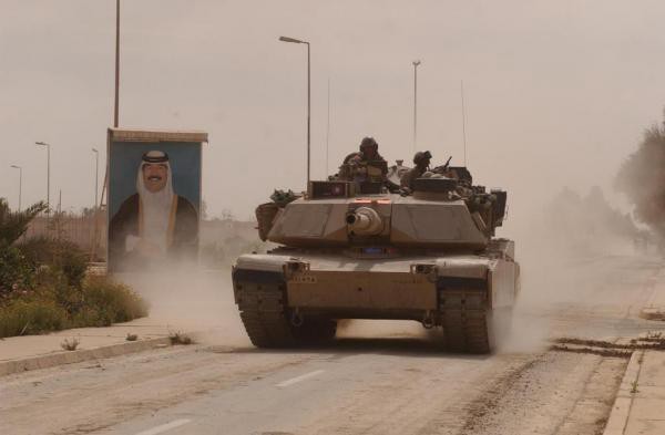 An Abrams tank from the 3rd Infantry Division races towards Baghdad during the 2003 invasion.