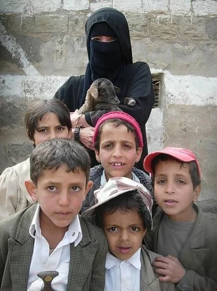 Yemeni kids; note boy on left is wearing a ceremonial knife. ( Yemen at the Crossroads )