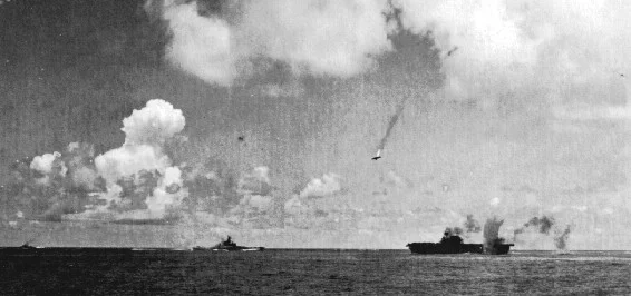 A Japanese “Val” Dive-Bomber is shot down over the USS Enterprise on October 26, 1942 during the Battle of Santa Cruz (Wikimedia Commons)