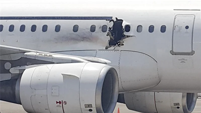 A one-meter hole in a Daallo Airlines aircraft, created by an explosion shortly after taking off from Mogadishu enroute to Djibouti. (AP Photo)