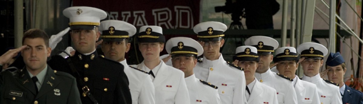 Graduating ROTC students. From left to right, Army Second Lieutenant Robert Huefner, Navy Second Lieutenant John Cancian (USMC), Ensigns Donald M. Coates, Erika E. Helbling, Patrick Morrissey, Erik Sand, Meredith Ellen Sandberg, Jonathan Sieg, Danielle Thiriot and Aaron Woodside, and Air Force Second Lieutenant Lauren L. Brown.