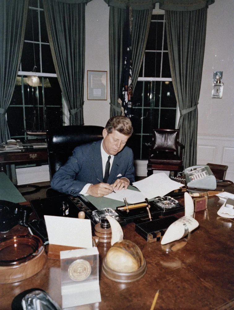 President John F. Kennedy signs the Interdiction of the Delivery of Offensive Weapons to Cuba. (Robert L. Knudsen/JFK Library)