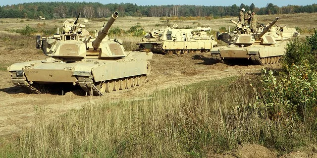 …to armored forces (Photo by U.S Army National Guard Spc. Brandon Ames)