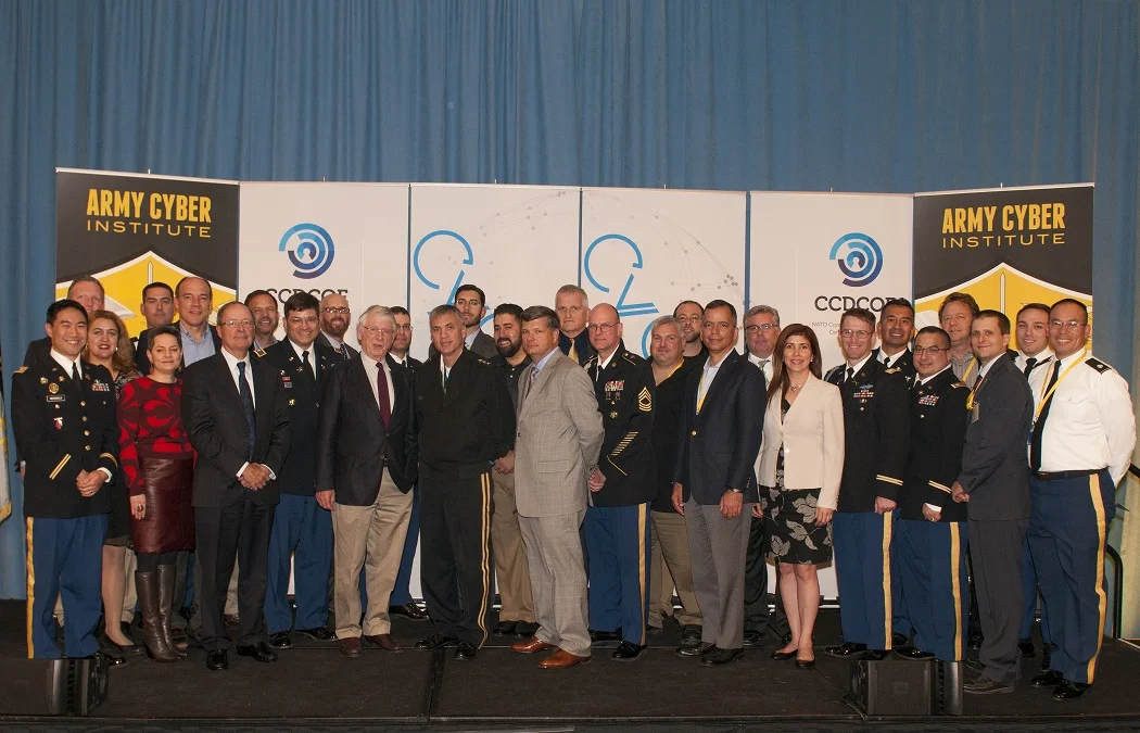 Army Cyber Institute members with LTG Paul Nakasone, GEN (R) Keith Alexander, Mr. Ted Koppel, Mr. Ronal Pontius at CyCon U.S. on Saturday, 22 October, 2016. (Army Cyber Institute at West Point)