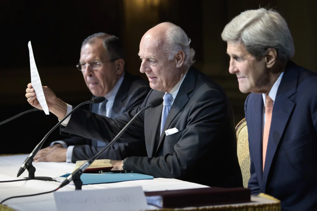 Russian Foreign Minister Sergei Lavrov, left, and, Secretary of State John Kerry, right, listen as UN Special Envoy for Syria Staffan de Mistura speaks during a news conference in Vienna, Austria, October 30, 2015. (Photo: AP/Brendan Smialowski)