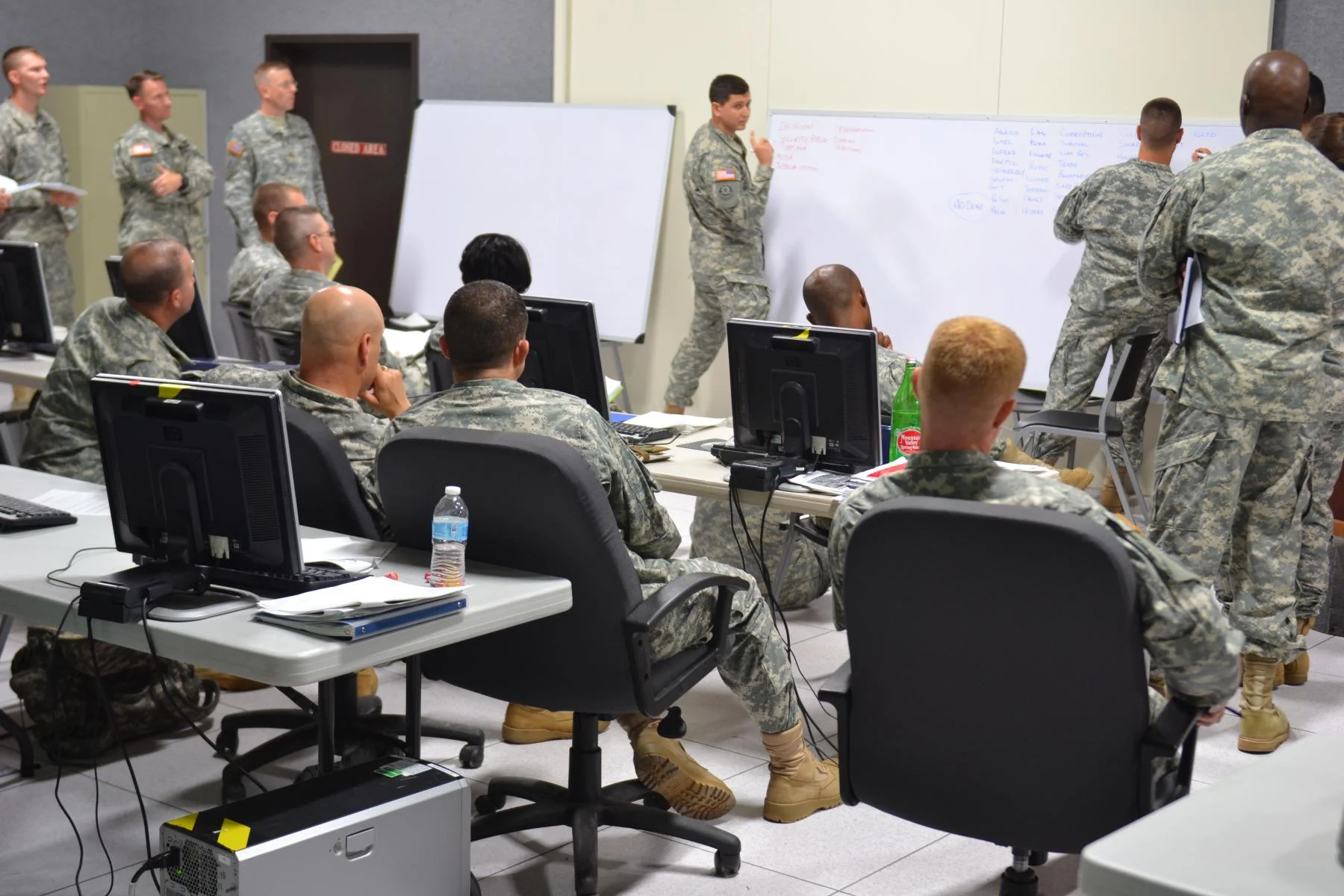 Duke students attending the Art of Design seminar work together to brainstorm and research combat operation topics. (Staff Sgt. Michael Lemmon/U.S. Army Photo)